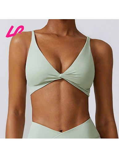 Cover up in style with our twist sports bra. Designed for comfort and support, it's a must-have for any workout wardrobe. Shop now and stay ahead of the trend.